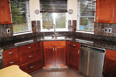 Inspiration for a mid-sized timeless u-shaped eat-in kitchen remodel in Seattle with medium tone wood cabinets