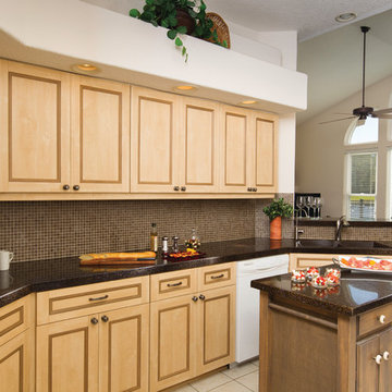 Traditional kitchen with brown glass countertop