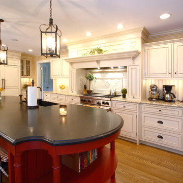 Traditional kitchen with painted cabinets