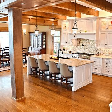 Traditional Kitchen with White Cabinets and Beam Ceiling