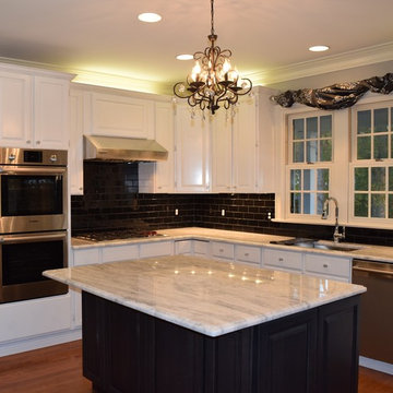 Traditional Kitchen with white cabinets and white countertops.