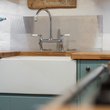 Traditional lever taps and Belfast sink.