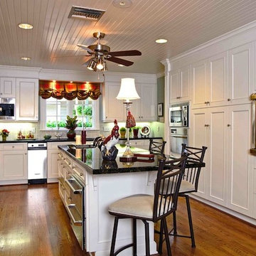 Traditional Style Kitchen with White Cabinets and Granite Countertops