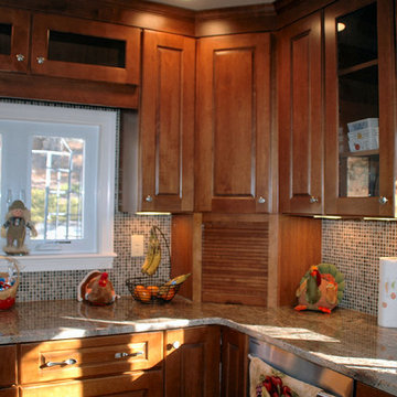 Traditional toffee kitchen remodel with multi-color mosaic tile back-splash