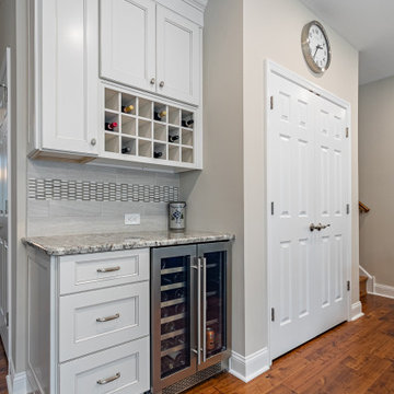 Traditional Warm and Creamy Kitchen + Laundry Room