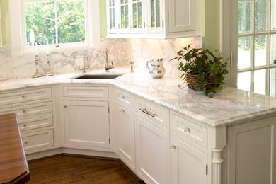 Traditional White Cabinets with Marble Countertops