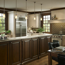 White cabinets with brown island