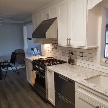 Traditional, white recessed panel kitchen