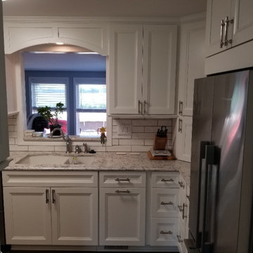 Traditional, white recessed panel kitchen