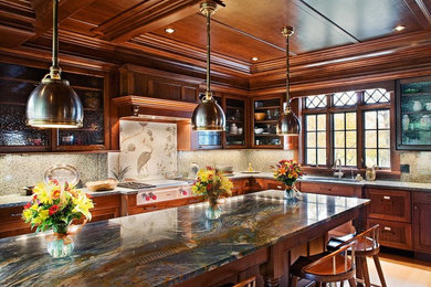 Eat-in kitchen - large traditional galley light wood floor eat-in kitchen idea in New York with a drop-in sink, raised-panel cabinets, dark wood cabinets, granite countertops, multicolored backsplash, ceramic backsplash, stainless steel appliances and an island