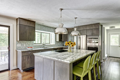 Medium sized traditional l-shaped kitchen pantry in New York with a submerged sink, flat-panel cabinets, quartz worktops, grey splashback, glass tiled splashback, stainless steel appliances, dark hardwood flooring, an island, brown floors, grey worktops and brown cabinets.