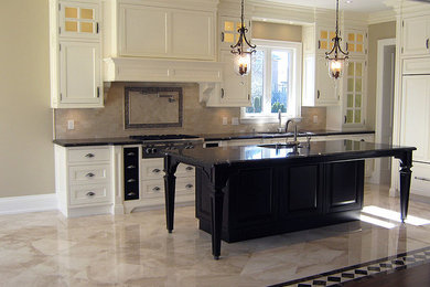Large transitional single-wall marble floor kitchen photo in Toronto with a double-bowl sink, raised-panel cabinets, white cabinets, granite countertops, beige backsplash, ceramic backsplash, paneled appliances and an island
