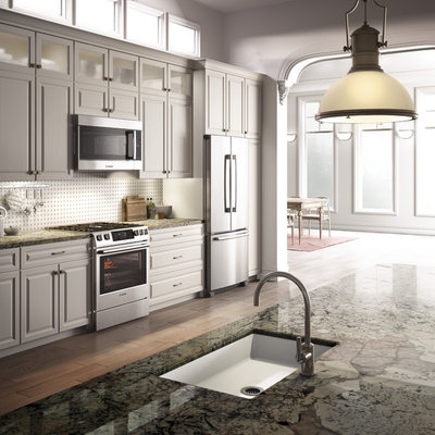 Example of a transitional kitchen design in Miami with an undermount sink and stainless steel appliances