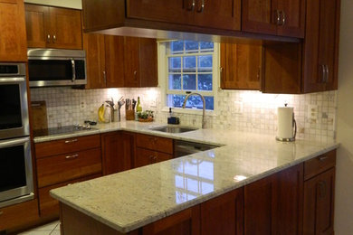 Inspiration for a mid-sized transitional u-shaped kitchen remodel in DC Metro with shaker cabinets and a peninsula