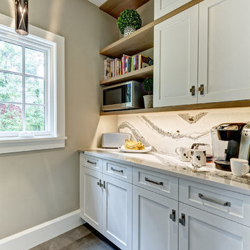 Transitional Kitchen with an Industrial Edge and Double Islands