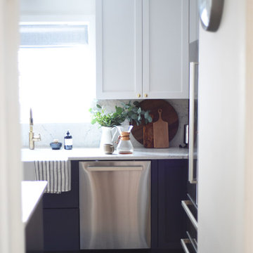 Transitional Kitchen with White and Blue Shaker Cabinets in Seattle, WA