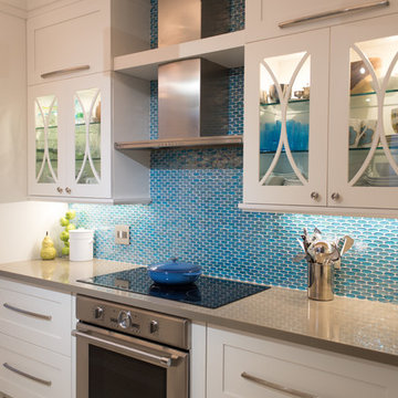 Transitional Kitchen with White Cabinets and Blue Backsplash