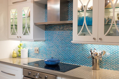 Transitional Kitchen with White Cabinets and Blue Backsplash