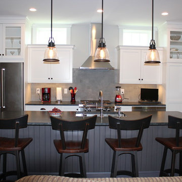 Transitional Kitchen with White Cabinets and Gray Island
