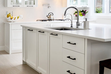 Example of a transitional kitchen design in Vancouver