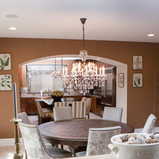 Mid-sized transitional u-shaped eat-in kitchen in Philadelphia with a drop-in sink, flat-panel cabinets, medium wood cabinets, zinc benchtops, beige splashback, terra-cotta splashback, stainless steel appliances, marble floors and with island.