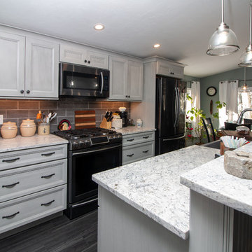 Transitional Steaked Limestone Kitchen Remodel w/ white Bahamas Granite top