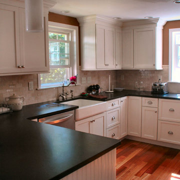 Transitional White Kitchen Remodel with Absolute Black leathered Countertop