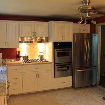 Transitional White Kitchen with White Springs Granite in Reisterstown, Maryland