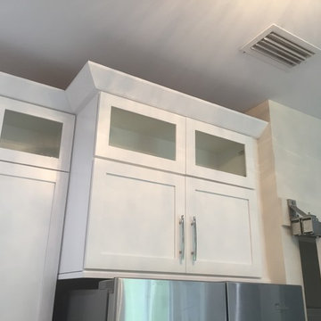 Transitional White with Glass Paneled Cabinetry