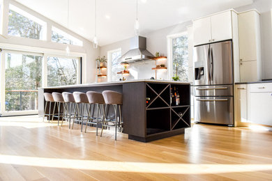 Example of a kitchen design in Boston with stainless steel appliances