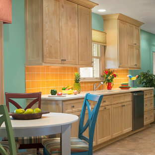 Large tropical galley eat-in kitchen in Milwaukee with an undermount sink, shaker cabinets, light wood cabinets, quartz benchtops, yellow splashback, terra-cotta splashback, stainless steel appliances, vinyl floors and no island.