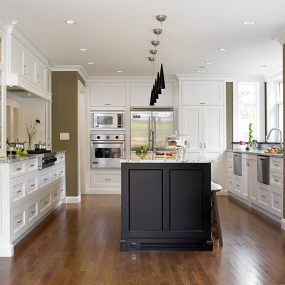 Inspiration for a transitional u-shaped kitchen remodel in Vancouver with recessed-panel cabinets, white cabinets and stainless steel appliances