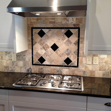 Tumbled Onyx Backsplash with Black Pearl Inserts