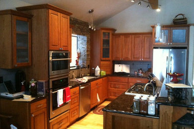 Example of a transitional kitchen design in Boise