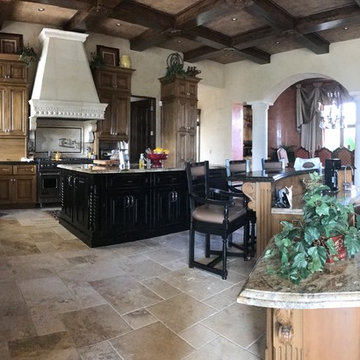 Tuscan style home with custom carpentry