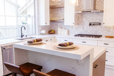 Inspiration for a mid-sized contemporary l-shaped gray floor and porcelain tile eat-in kitchen remodel in Orange County with an undermount sink, shaker cabinets, white cabinets, gray backsplash, mosaic tile backsplash, stainless steel appliances, an island and marble countertops
