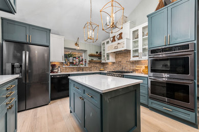 Mid-sized cottage u-shaped light wood floor and beige floor eat-in kitchen photo in Houston with an undermount sink, shaker cabinets, turquoise cabinets, quartz countertops, brown backsplash, brick backsplash, stainless steel appliances, an island and white countertops