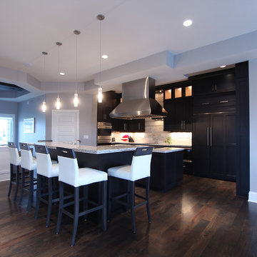 Two Island Kitchen with Dark Stained Cabinets