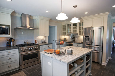 Inspiration for a craftsman kitchen remodel in Detroit with soapstone countertops and white cabinets