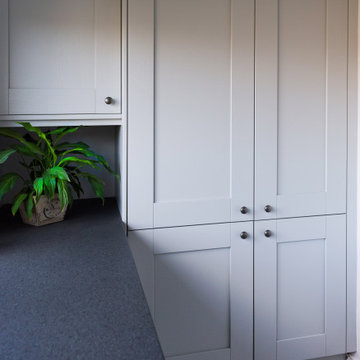 Two tone Grey shaker traditional kitchen with connecting Island.