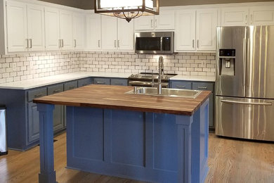Two tone kitchen with custom butcher block