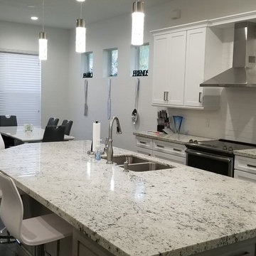 Two Toned Kitchen Full Remodel featuring White & Gray Cabinetry and Granite tops