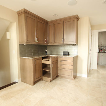 Two Toned Maple Kitchen with Grey Island and Granite Countertop