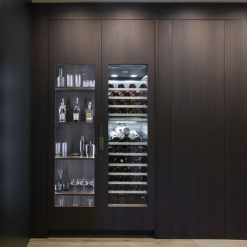 Ultra Contemporary Cabinetry with Hidden Traditional Kitchen Furniture