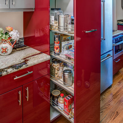 Small minimalist l-shaped light wood floor eat-in kitchen photo in San Francisco with red cabinets, granite countertops, multicolored backsplash, stainless steel appliances, no island and flat-panel cabinets