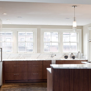 Inspiration for a contemporary u-shaped kitchen remodel in Boston with stainless steel appliances, marble countertops, flat-panel cabinets, dark wood cabinets and marble backsplash