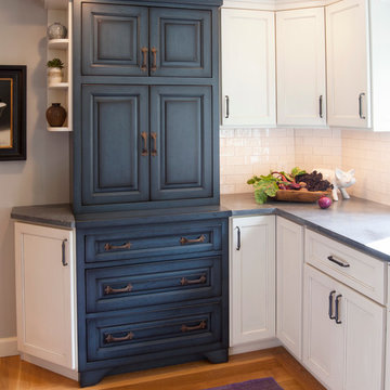 Unique custom kitchen designed around blue cabinetry