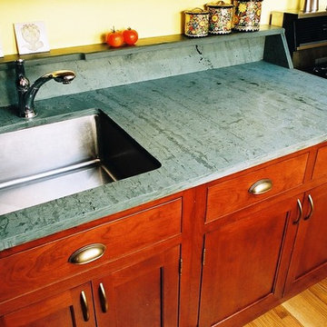 Unique sink materials in kitchens and baths