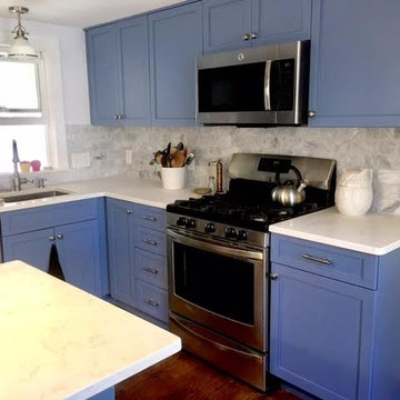 Updated and simple Craftsman style colonial kitchen in blue