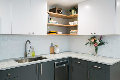 This is an example of a small modern kitchen in New York.